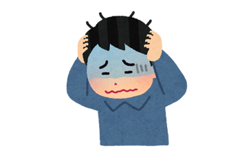 ストレスで頭を抱える男性